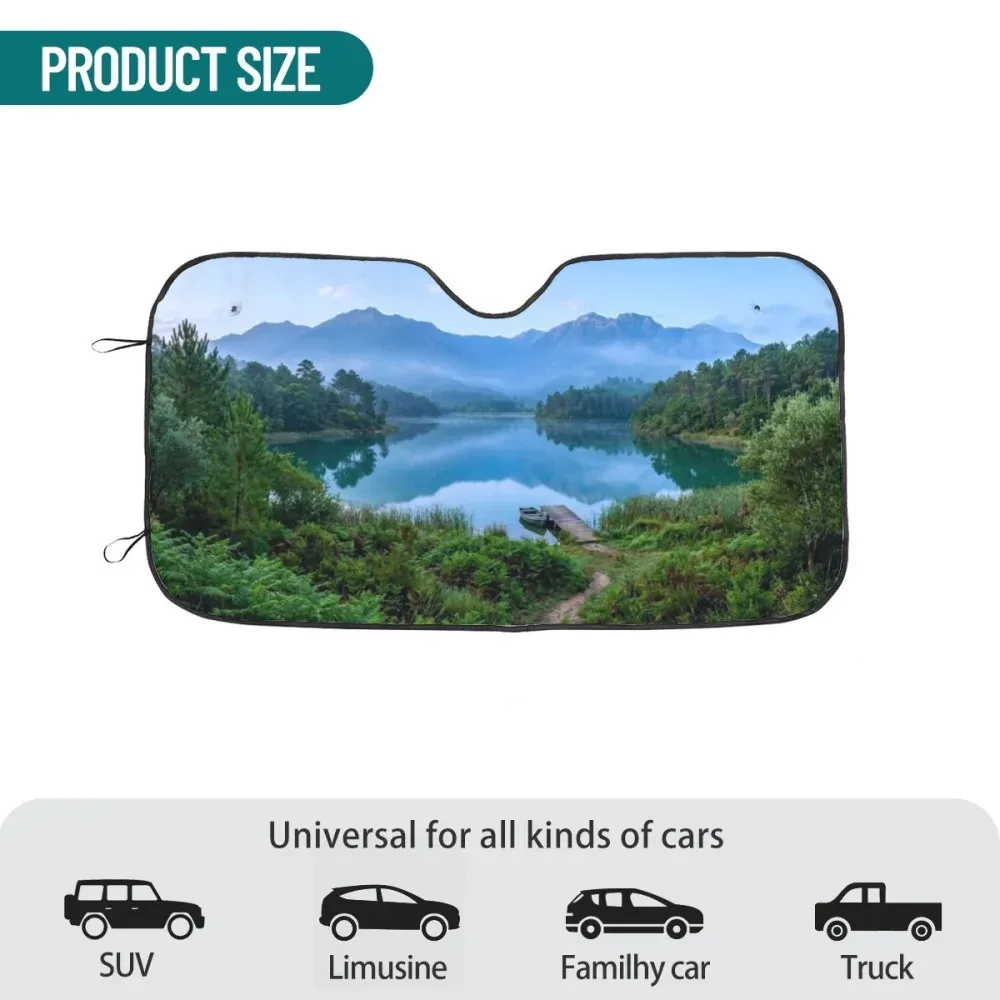 Para-sol de carro com paisagem de lago e montanhas.